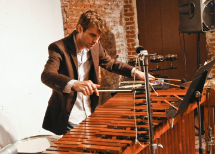 [Ben Phelps playing percussion]